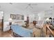 Spacious living room with hardwood floors and ample seating at 554 Fallbrook Dr, Venice, FL 34292
