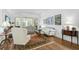 Spacious living room with hardwood floors and comfortable seating at 554 Fallbrook Dr, Venice, FL 34292