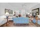 Comfortable living room with light walls and hardwood floors at 554 Fallbrook Dr, Venice, FL 34292
