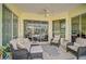 Cozy sunroom offering ample seating and access to outdoor space at 554 Fallbrook Dr, Venice, FL 34292