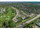 Aerial view showcasing community layout near golf course at 5933 Clubside Dr # 7640, Sarasota, FL 34243