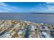 Wide aerial view of waterfront homes and canals at 634 Key Royale Dr, Holmes Beach, FL 34217