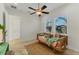 Cozy bedroom with daybed and access to hallway at 634 Key Royale Dr, Holmes Beach, FL 34217