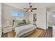 Bedroom with a queen bed, hardwood floors, and ensuite bathroom at 634 Key Royale Dr, Holmes Beach, FL 34217