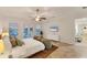 Bright bedroom with a comfortable bed and access to a balcony at 634 Key Royale Dr, Holmes Beach, FL 34217