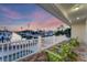 Relaxing waterfront deck with sunset view at 634 Key Royale Dr, Holmes Beach, FL 34217