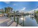 Private dock provides convenient boat access at 634 Key Royale Dr, Holmes Beach, FL 34217