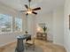 Home office with desk, chair, and built-in shelving at 634 Key Royale Dr, Holmes Beach, FL 34217