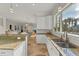Modern kitchen with granite countertops and stainless steel appliances at 634 Key Royale Dr, Holmes Beach, FL 34217