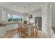 Modern kitchen with island and stainless steel appliances at 634 Key Royale Dr, Holmes Beach, FL 34217