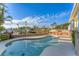 Freeform swimming pool with relaxing seating and waterfront views at 634 Key Royale Dr, Holmes Beach, FL 34217