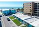 Oceanfront property, community pool, and tennis courts at 6424 Midnight Pass Rd # 12A, Sarasota, FL 34242