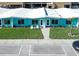 Cute teal building with lush landscaping and parking at 6424 Midnight Pass Rd # 12A, Sarasota, FL 34242