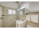 Clean bathroom with a shower/tub combo and updated vanity at 6424 Midnight Pass Rd # 12A, Sarasota, FL 34242