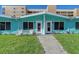 Two-unit building with beachy exterior and walkway at 6424 Midnight Pass Rd # 12A, Sarasota, FL 34242