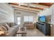 Living room featuring wood ceilings and beach decor at 6424 Midnight Pass Rd # 12A, Sarasota, FL 34242