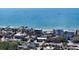Aerial view of beachfront homes and properties showcasing oceanfront living at 6501 Gulf Of Mexico Dr, Longboat Key, FL 34228