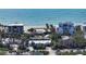 Aerial view of beachfront home near ocean at 6501 Gulf Of Mexico Dr, Longboat Key, FL 34228