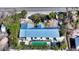 Aerial view of a single story home with a pool and fenced backyard at 6501 Gulf Of Mexico Dr, Longboat Key, FL 34228