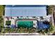 An aerial shot of a home with a fenced-in pool and backyard oasis at 6501 Gulf Of Mexico Dr, Longboat Key, FL 34228