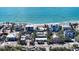 Aerial view of a beachfront home with ocean access at 6501 Gulf Of Mexico Dr, Longboat Key, FL 34228