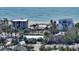 Aerial view of beachfront home near ocean at 6501 Gulf Of Mexico Dr, Longboat Key, FL 34228