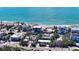 Aerial view of a beachfront home with ocean access at 6501 Gulf Of Mexico Dr, Longboat Key, FL 34228