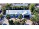 Aerial view of a single-Gathering home with metal roof at 6501 Gulf Of Mexico Dr, Longboat Key, FL 34228