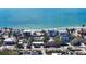 Aerial view of beachfront homes and properties showcasing oceanfront living at 6501 Gulf Of Mexico Dr, Longboat Key, FL 34228
