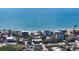 Aerial view of beachfront homes and properties showcasing oceanfront living at 6501 Gulf Of Mexico Dr, Longboat Key, FL 34228