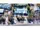 Aerial view of home with pool and landscaping at 6501 Gulf Of Mexico Dr, Longboat Key, FL 34228