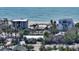 Aerial view of beachfront homes and construction at 6501 Gulf Of Mexico Dr, Longboat Key, FL 34228