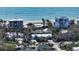 Aerial view of a beachfront home with ocean access at 6501 Gulf Of Mexico Dr, Longboat Key, FL 34228