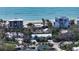 Aerial view of beachfront homes and properties showcasing oceanfront living at 6501 Gulf Of Mexico Dr, Longboat Key, FL 34228