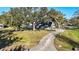 House with a long driveway and lake view at 6706 88Th E St, Bradenton, FL 34202