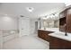 Elegant bathroom with double vanity, soaking tub, and walk-in shower at 6706 88Th E St, Bradenton, FL 34202