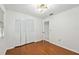Spacious bedroom featuring wood floors and built-in closet at 6706 88Th E St, Bradenton, FL 34202