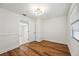 Bright bedroom featuring wood flooring and neutral walls at 6706 88Th E St, Bradenton, FL 34202