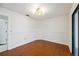 Bright bedroom with hardwood floors and access to balcony at 6706 88Th E St, Bradenton, FL 34202