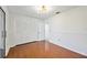 Bright bedroom with wood floors and ample closet space at 6706 88Th E St, Bradenton, FL 34202