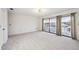 Spacious bedroom with balcony access and water views at 6706 88Th E St, Bradenton, FL 34202