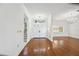Bright and airy entryway with hardwood floors and double doors at 6706 88Th E St, Bradenton, FL 34202