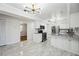 Renovated kitchen with white cabinets and granite island at 6706 88Th E St, Bradenton, FL 34202