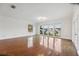 Living room with hardwood floors, large windows and view of lake at 6706 88Th E St, Bradenton, FL 34202