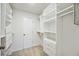Large walk-in closet with ample shelving and drawers at 6706 88Th E St, Bradenton, FL 34202