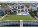 Lovely home with a waterfront view, swimming pool, and spacious backyard at 696 Regatta Way, Bradenton, FL 34208