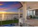 Relaxing balcony offering waterfront sunset views at 696 Regatta Way, Bradenton, FL 34208