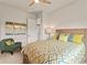 Charming bedroom with restful decor and a cozy armchair at 696 Regatta Way, Bradenton, FL 34208