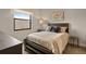 Cozy bedroom with neutral decor and ample natural light at 696 Regatta Way, Bradenton, FL 34208