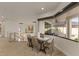 Cozy breakfast nook with a table and chairs, overlooking a balcony at 696 Regatta Way, Bradenton, FL 34208